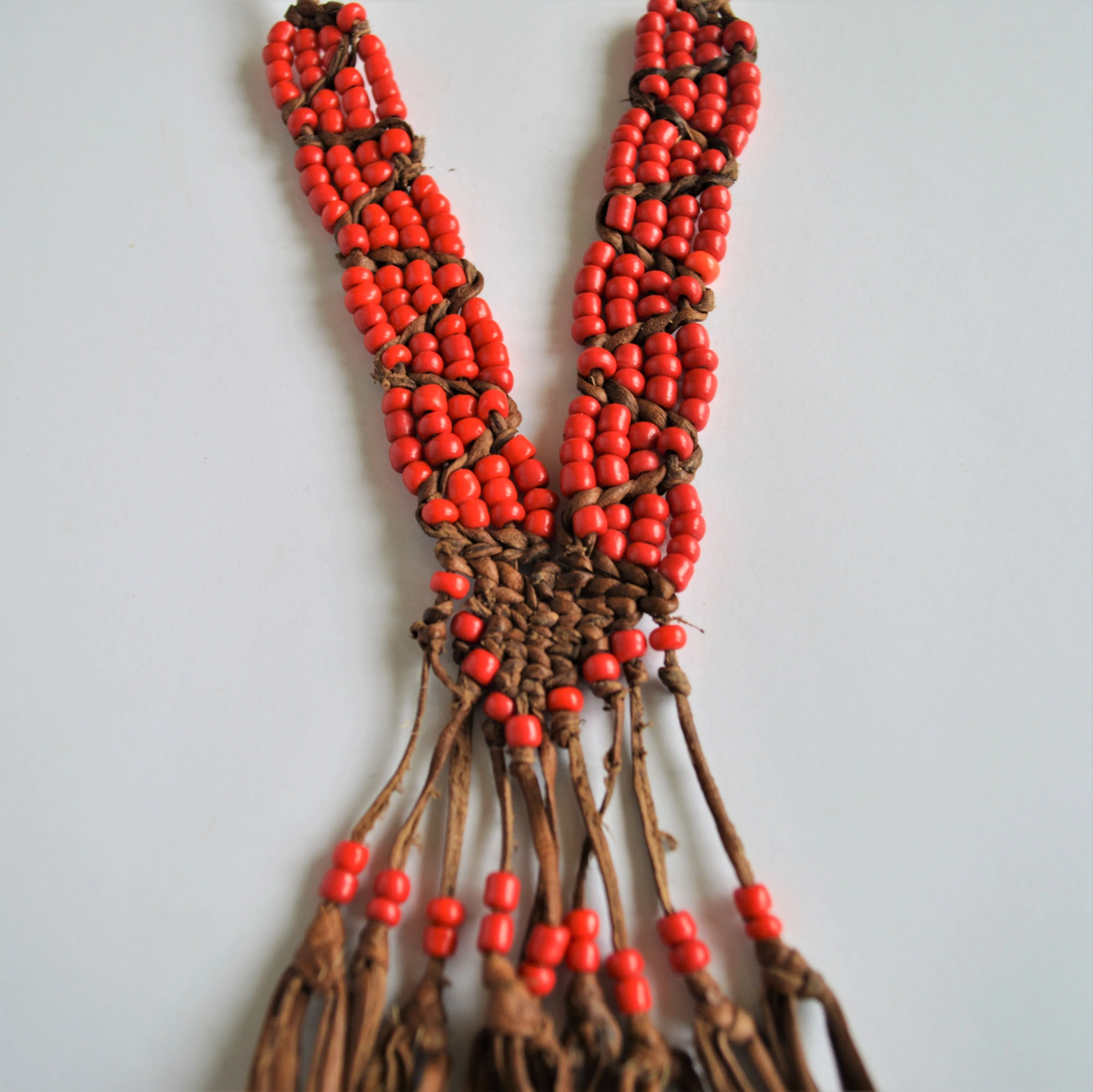 Leather necklace with red beads